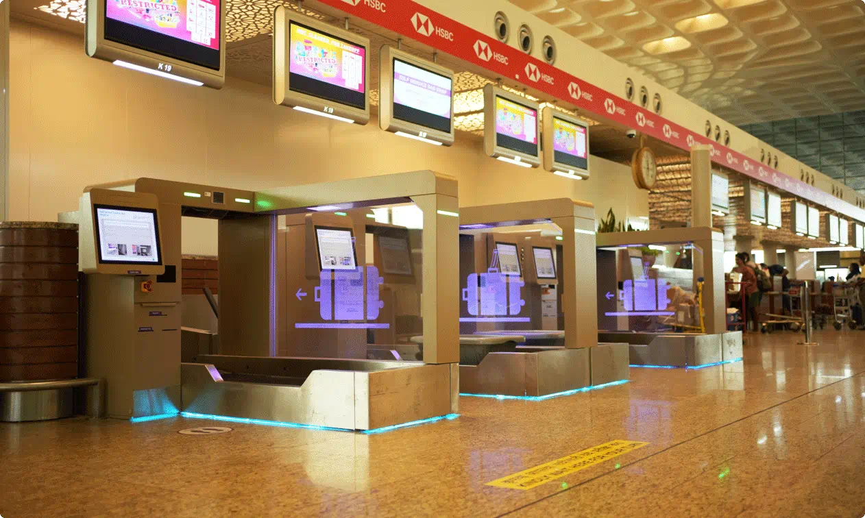 Passenger searching for lost luggage or personal item at Mumbai Airport terminal